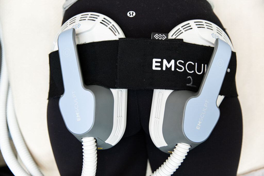 Close up of the Emsculpt NEO device treating a person's buttocks to acheive body contouring in Cherry Hills Village