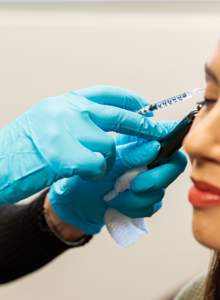 a woman receives injectables in denver