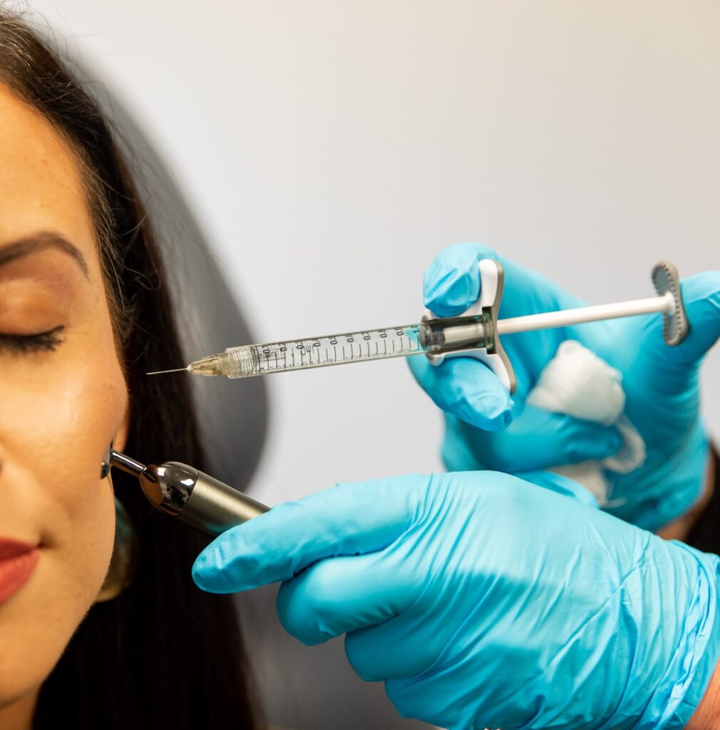 A woman getting biostimulator injections for skin rejuvenation in Denver