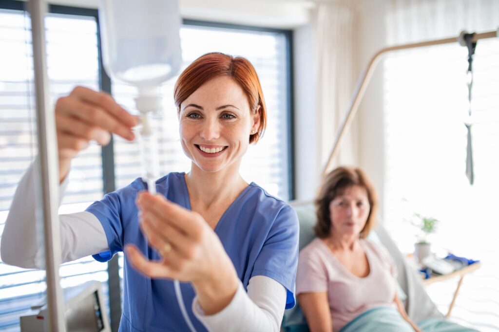 A nurse performs NAD+ IV therapy in Denver