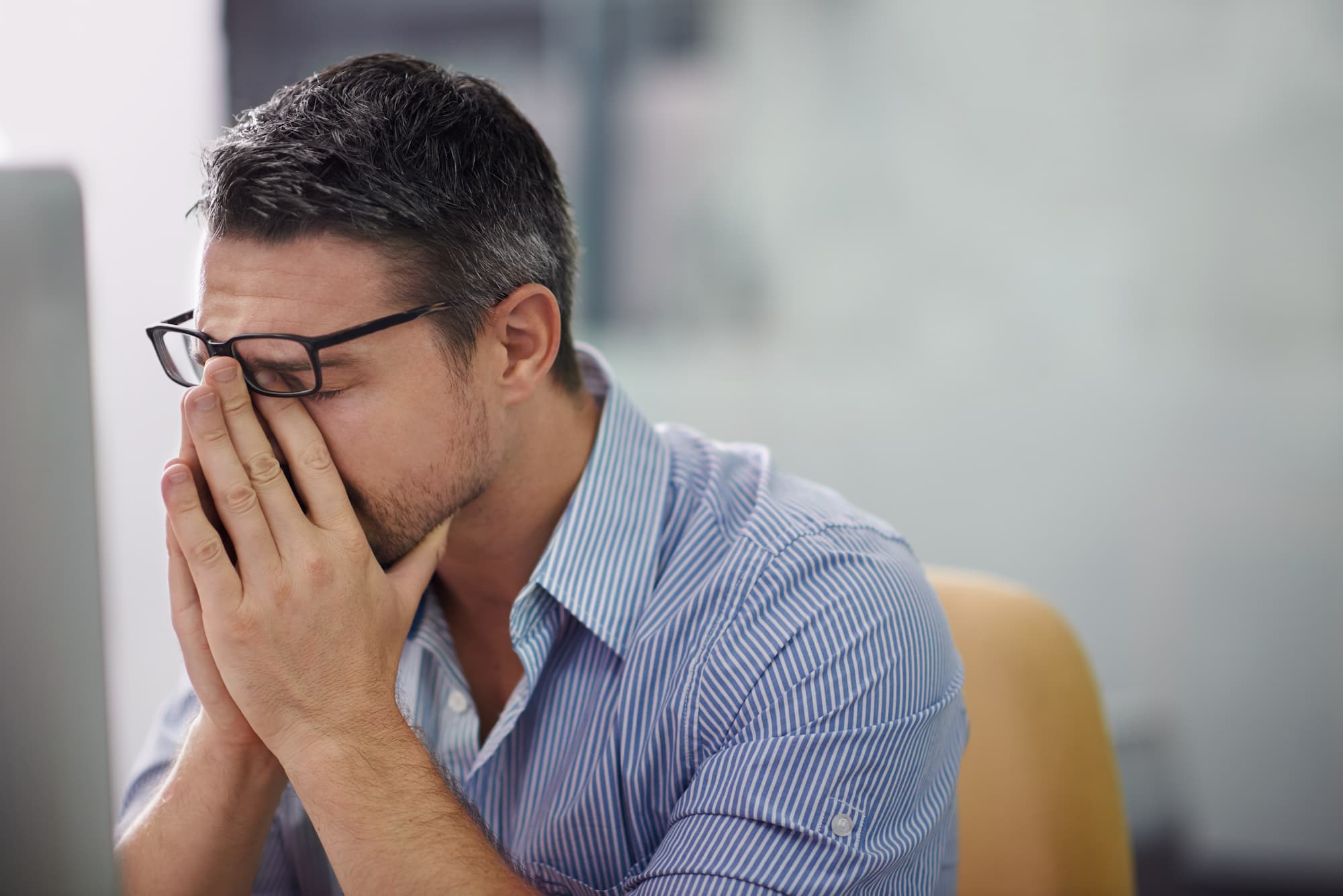 a man is stressed which is causing hair loss