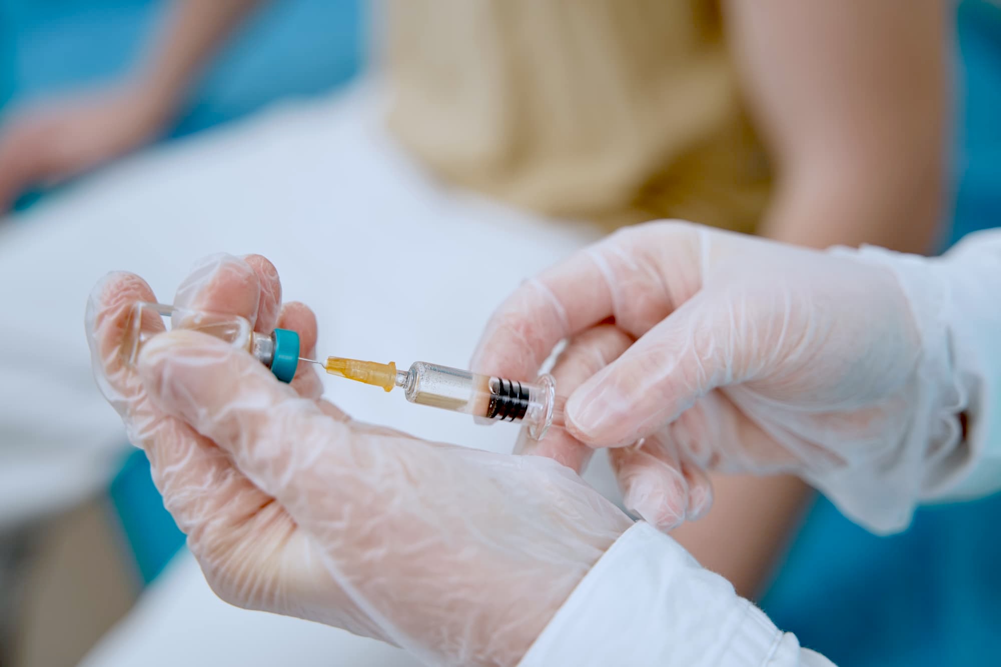 Close up of a nurse prepping needle for medical weight loss near Cherry Hils Village